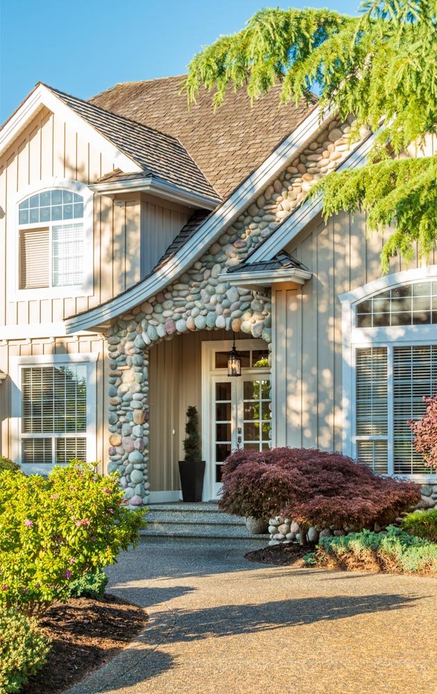 Beautiful home exterior with stone features